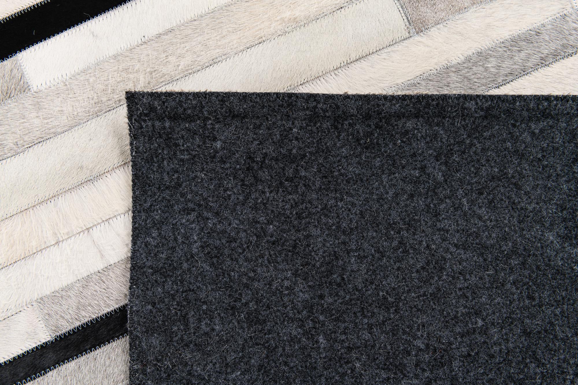 5' 1 x 7' 11 Cowhide Stocks Rug