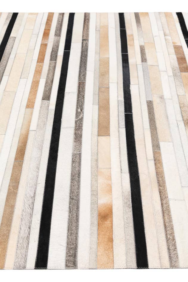 Detail image of 5' 1 x 8' Cowhide Stocks Rug