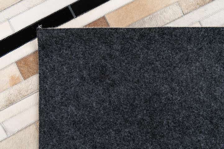 5' 1 x 8' Cowhide Stocks Rug