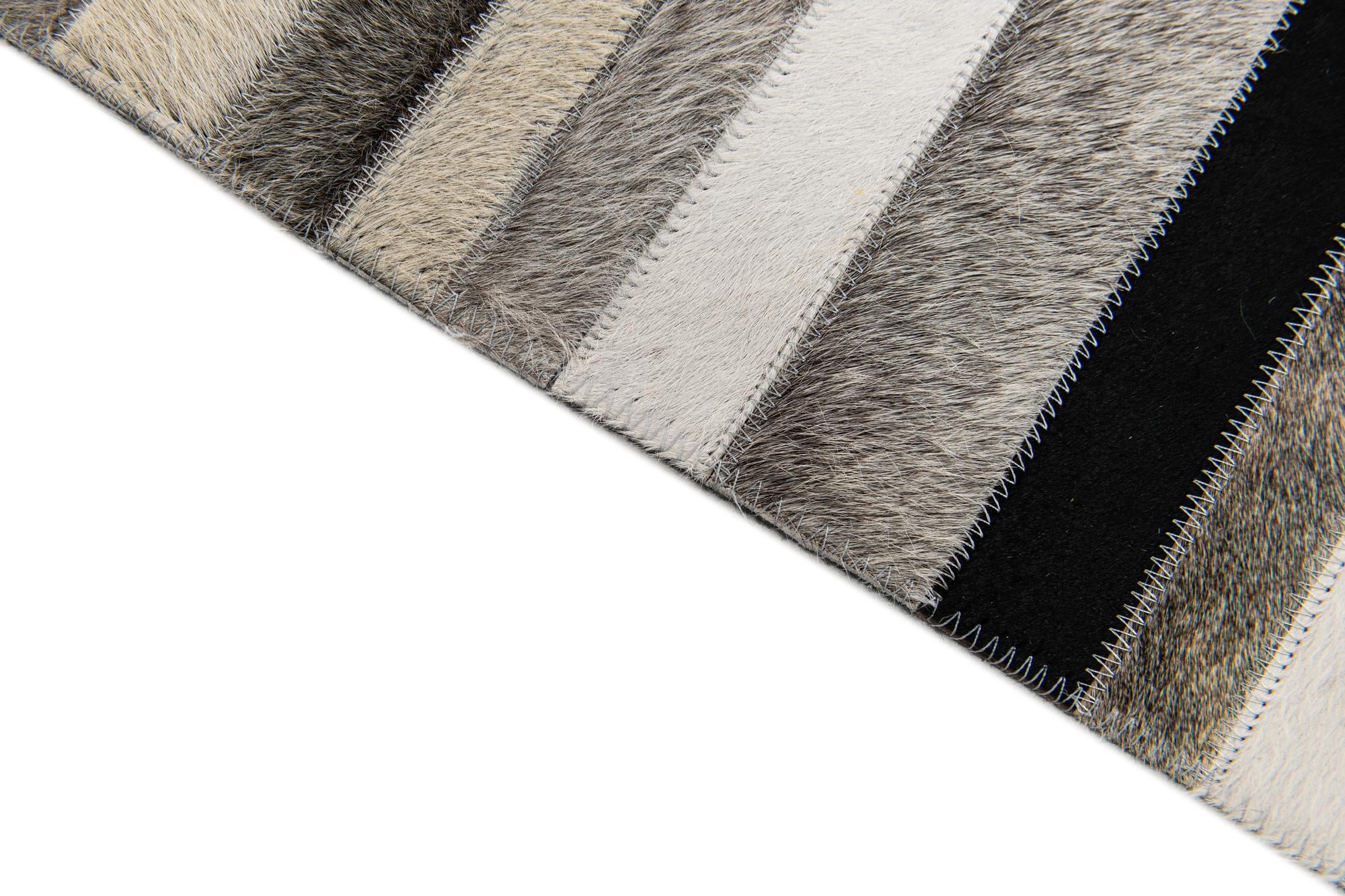 5' x 8' Cowhide Stocks Rug