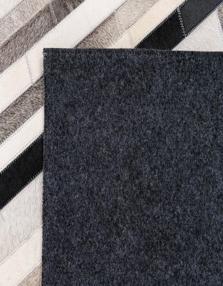 Detail image of 5' x 8' Cowhide Stocks Rug