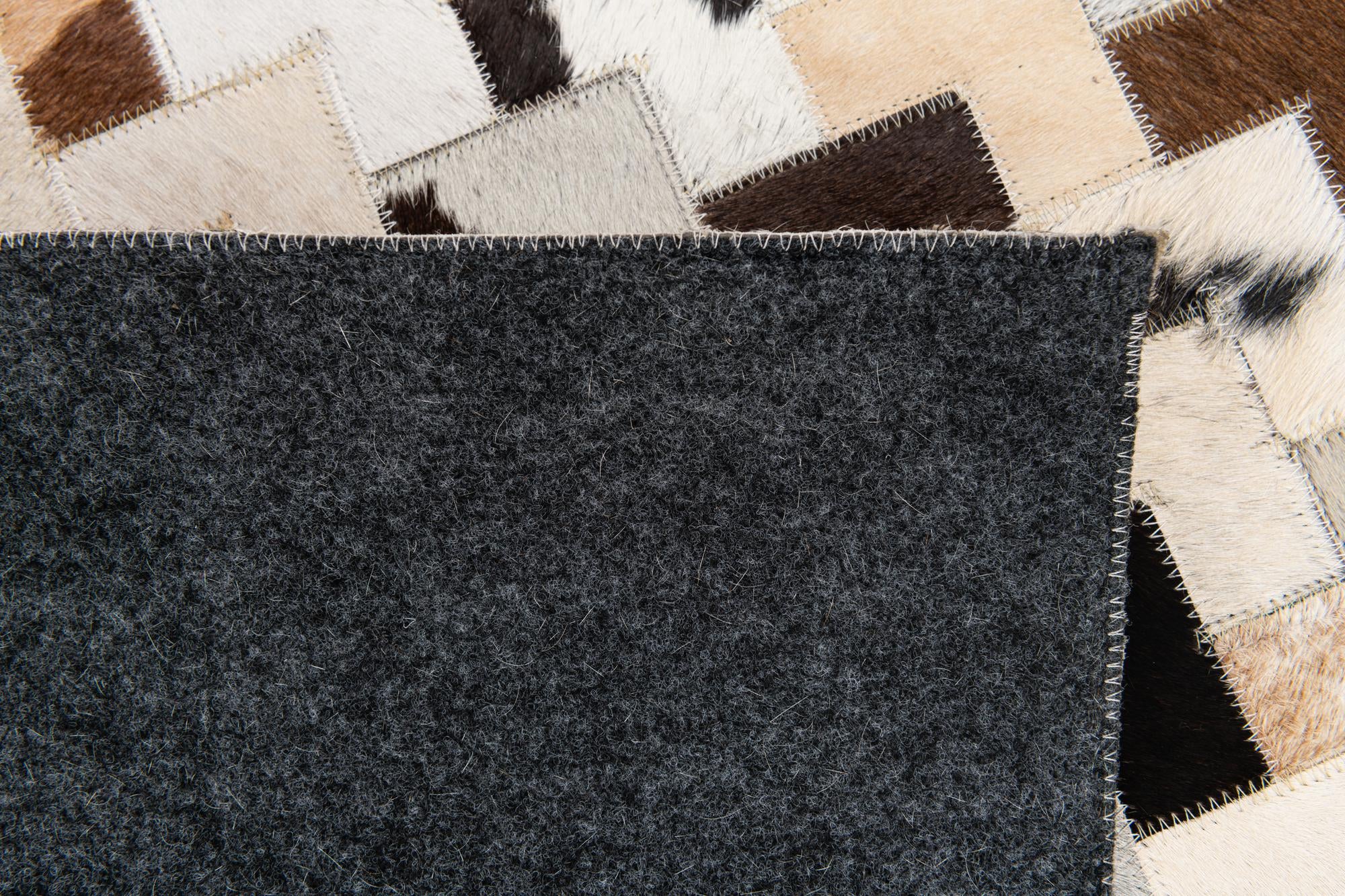 5' 1 x 7' 11 Cowhide Stocks Rug