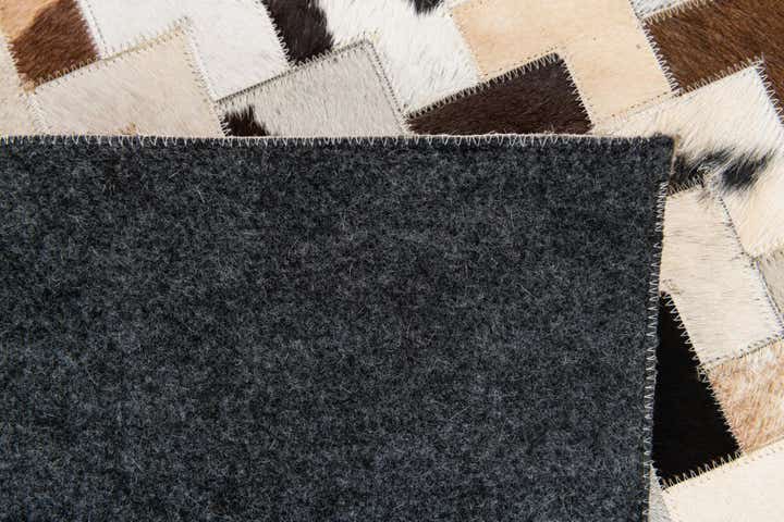 5' 1 x 7' 11 Cowhide Stocks Rug