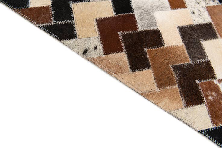 Detail image of 5' 1 x 8' Cowhide Stocks Rug
