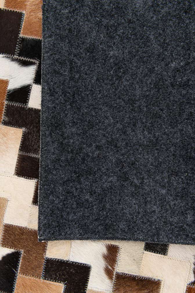 5' 1 x 8' Cowhide Stocks Rug