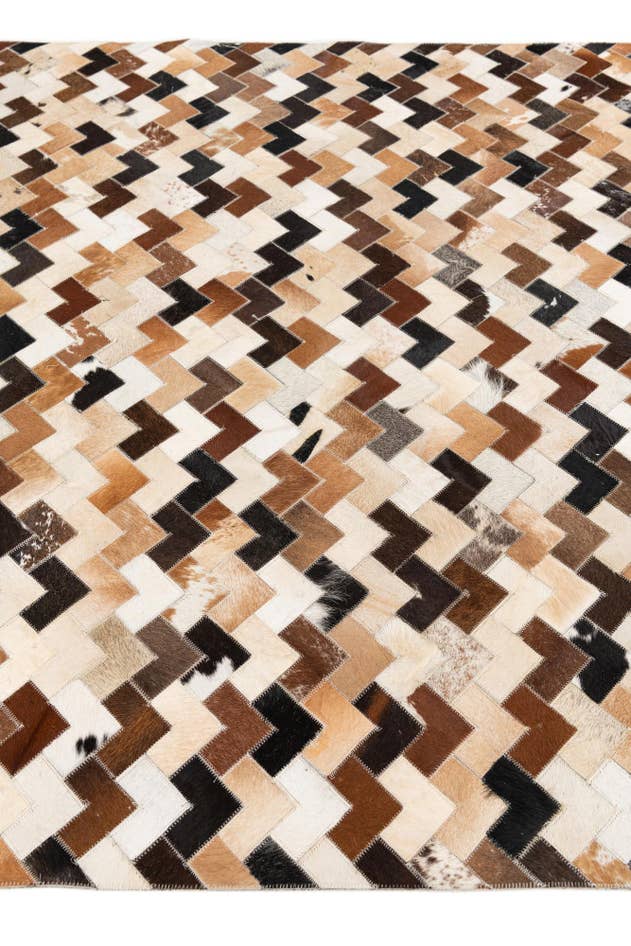 Detail image of 5' 1 x 8' Cowhide Stocks Rug