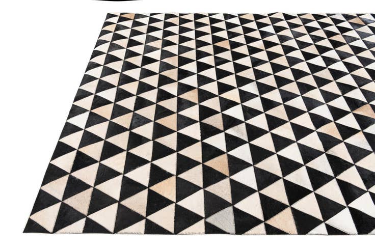 Detail image of 5' 1 x 8' 2 Cowhide Stocks Rug