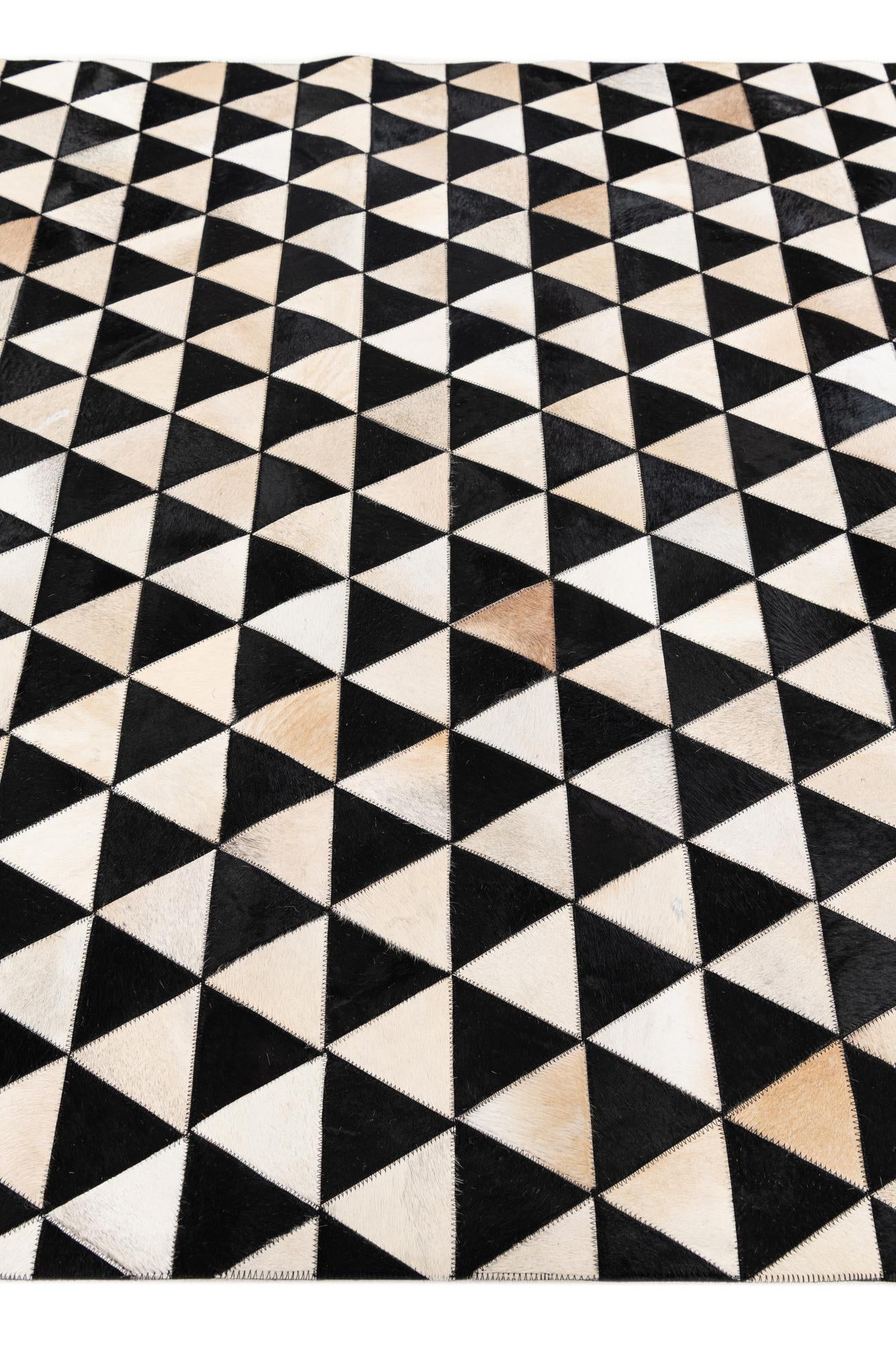 5' 1 x 8' 2 Cowhide Stocks Rug