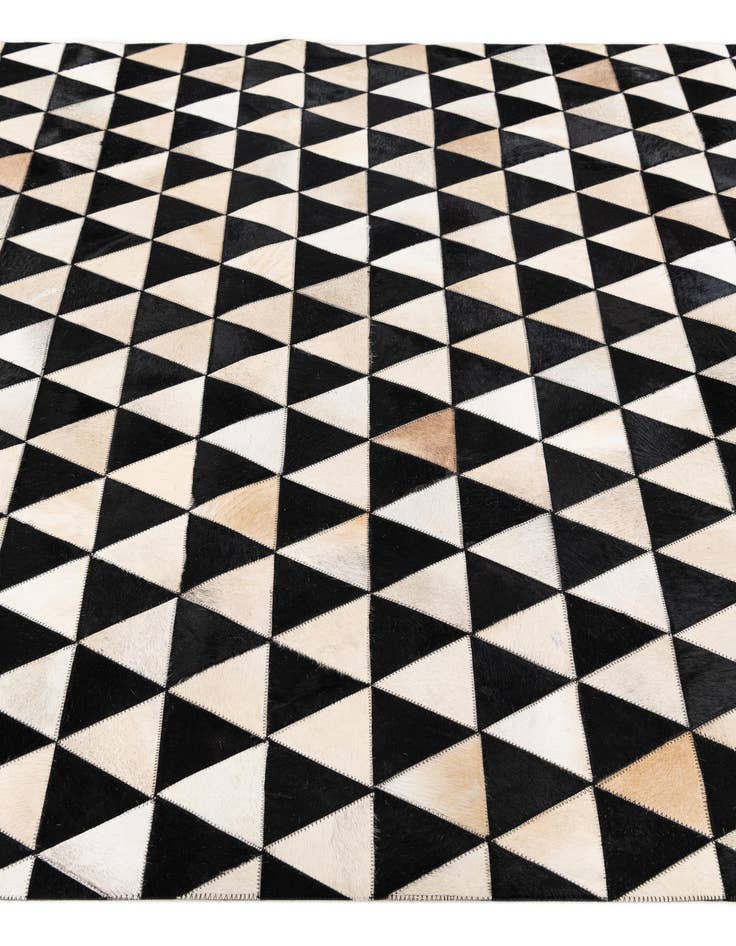 Detail image of 5' 1 x 8' 2 Cowhide Stocks Rug