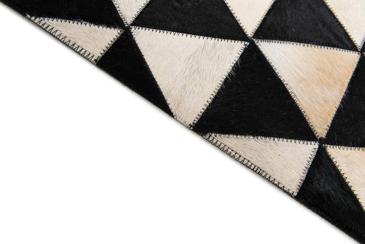 Detail image of 5' 1 x 8' 2 Cowhide Stocks Rug
