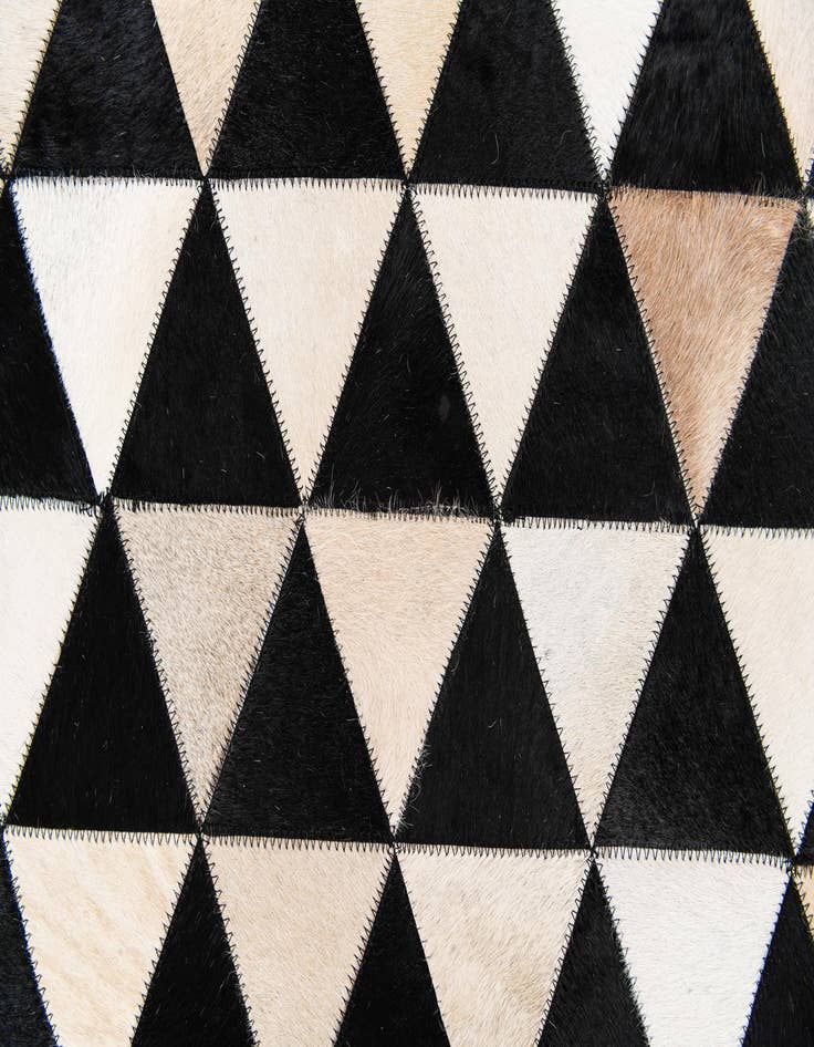 Detail image of 5' 1 x 8' 2 Cowhide Stocks Rug