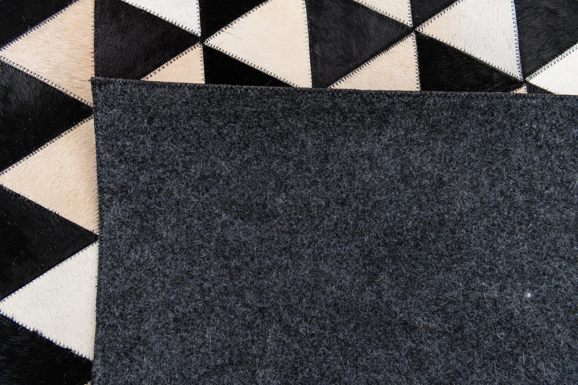 5' 1 x 8' 2 Cowhide Stocks Rug