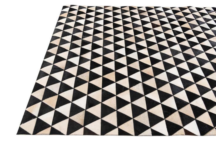 Detail image of 5' 2 x 8' Cowhide Stocks Rug