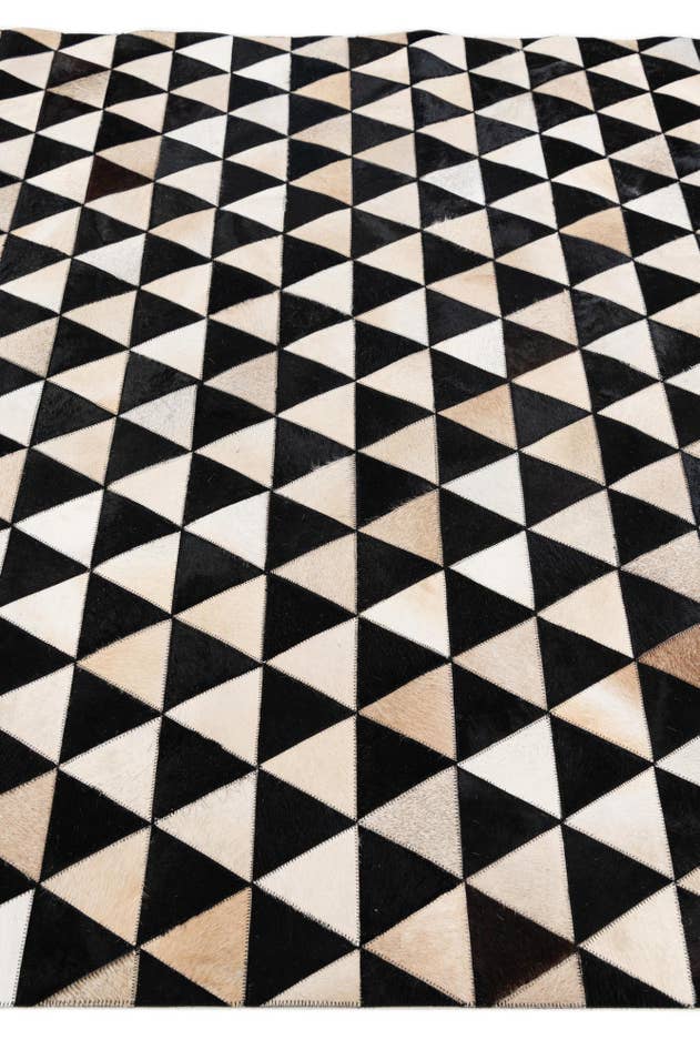 Detail image of 5' 2 x 8' Cowhide Stocks Rug