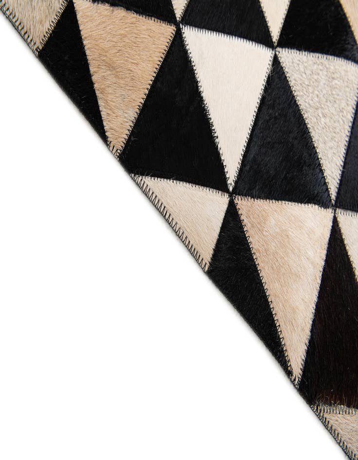 Detail image of 5' 2 x 8' Cowhide Stocks Rug