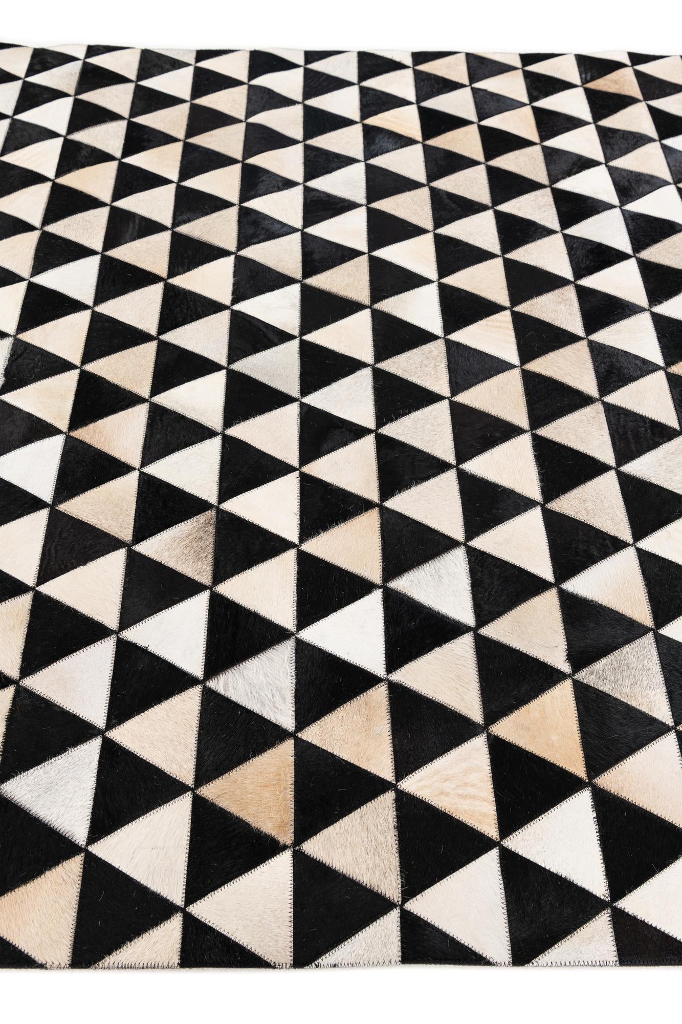 5' 1 x 8' 1 Cowhide Stocks Rug
