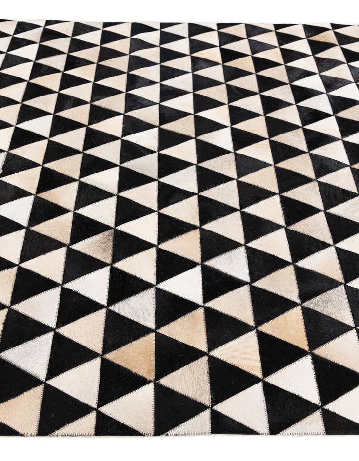 Detail image of 5' 1 x 8' 1 Cowhide Stocks Rug