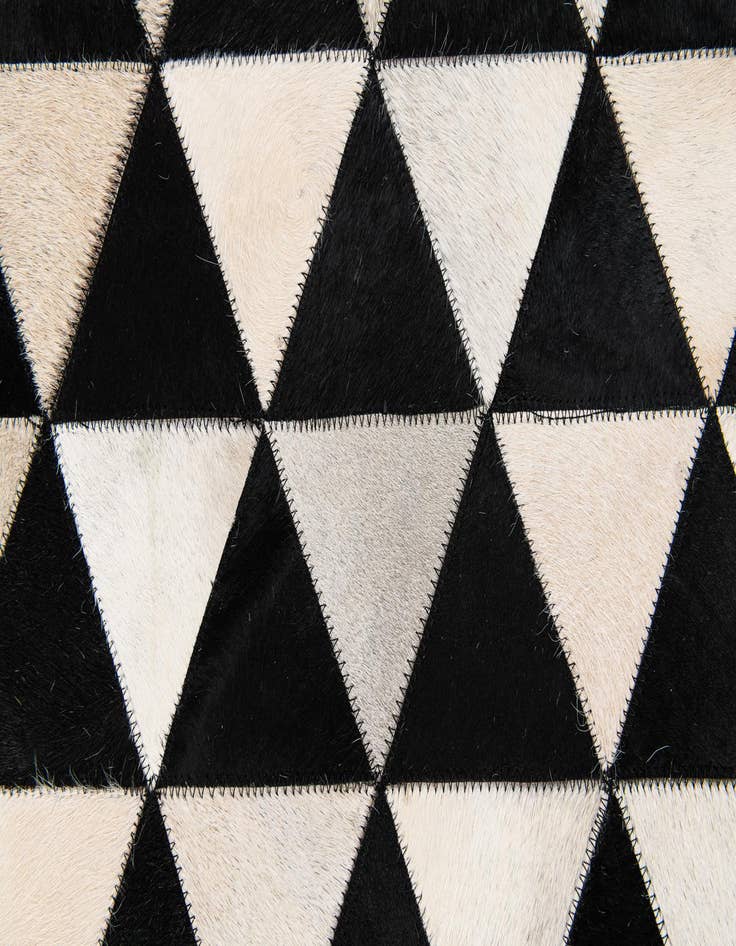 Detail image of 5' 1 x 8' 1 Cowhide Stocks Rug