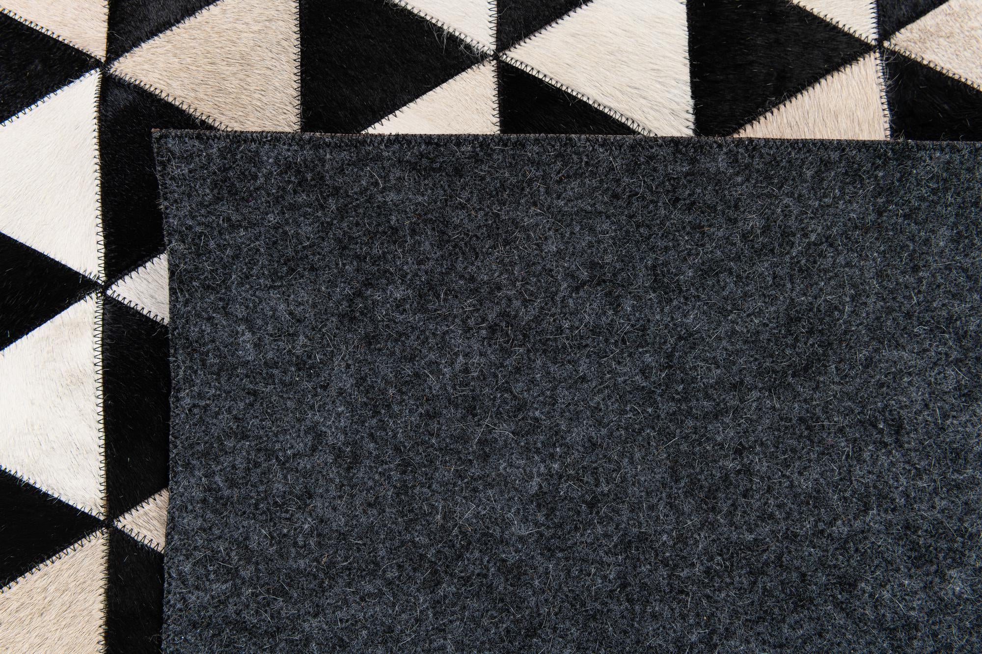 5' 1 x 8' 1 Cowhide Stocks Rug