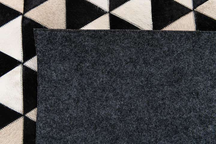 5' 1 x 8' 1 Cowhide Stocks Rug