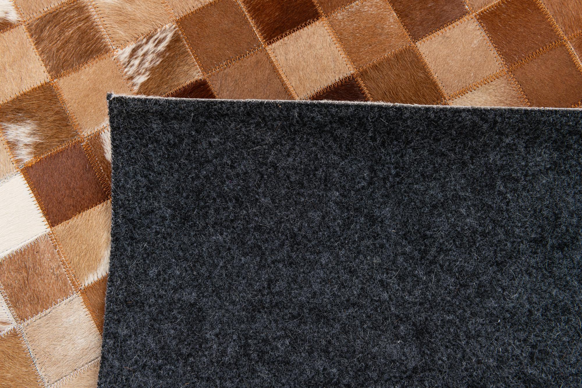 4' 11 x 7' 9 Cowhide Stocks Rug