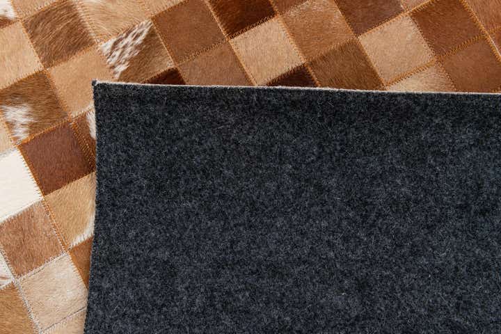 4' 11 x 7' 9 Cowhide Stocks Rug