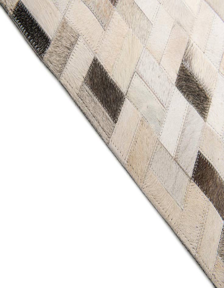 Detail image of 5' 3 x 7' 5 Cowhide Stocks Rug