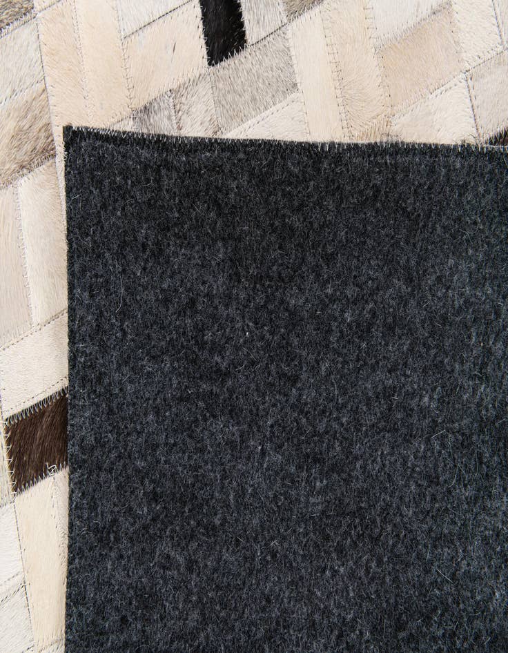 Detail image of 5' 3 x 7' 5 Cowhide Stocks Rug