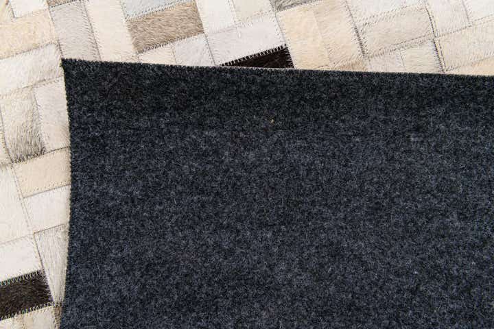 5' 3 x 7' 5 Cowhide Stocks Rug