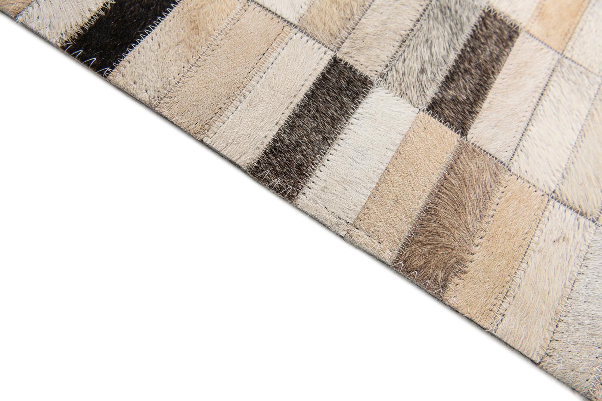5' 1 x 7' 10 Cowhide Stocks Rug