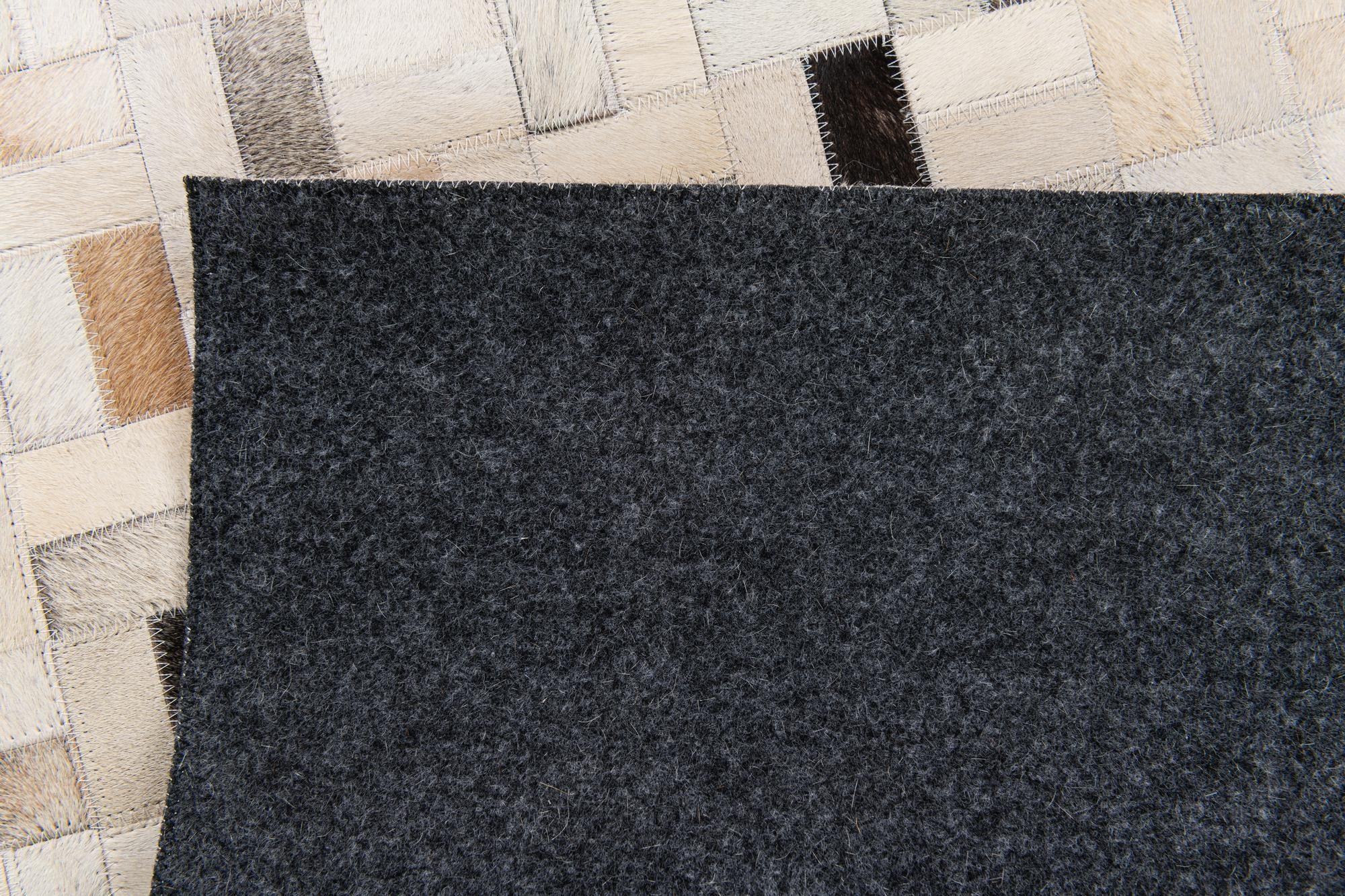 5' 3 x 7' 6 Cowhide Stocks Rug