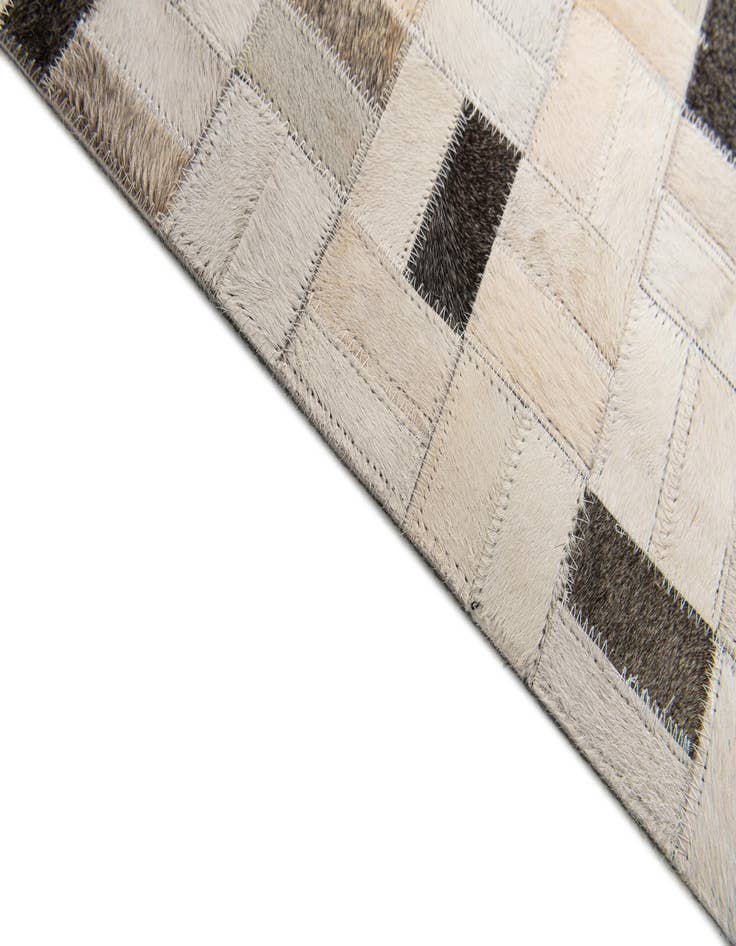 Detail image of 5' 3 x 7' 5 Cowhide Stocks Rug
