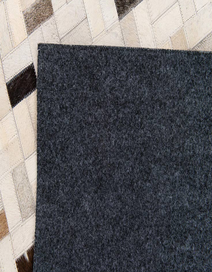 Detail image of 5' 3 x 7' 5 Cowhide Stocks Rug