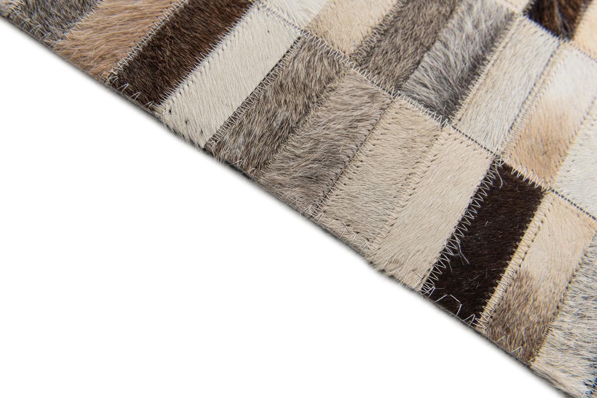 5' 1 x 7' 10 Cowhide Stocks Rug