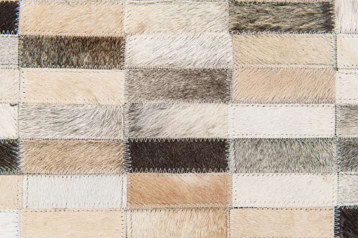 5' 1 x 7' 10 Cowhide Stocks Rug