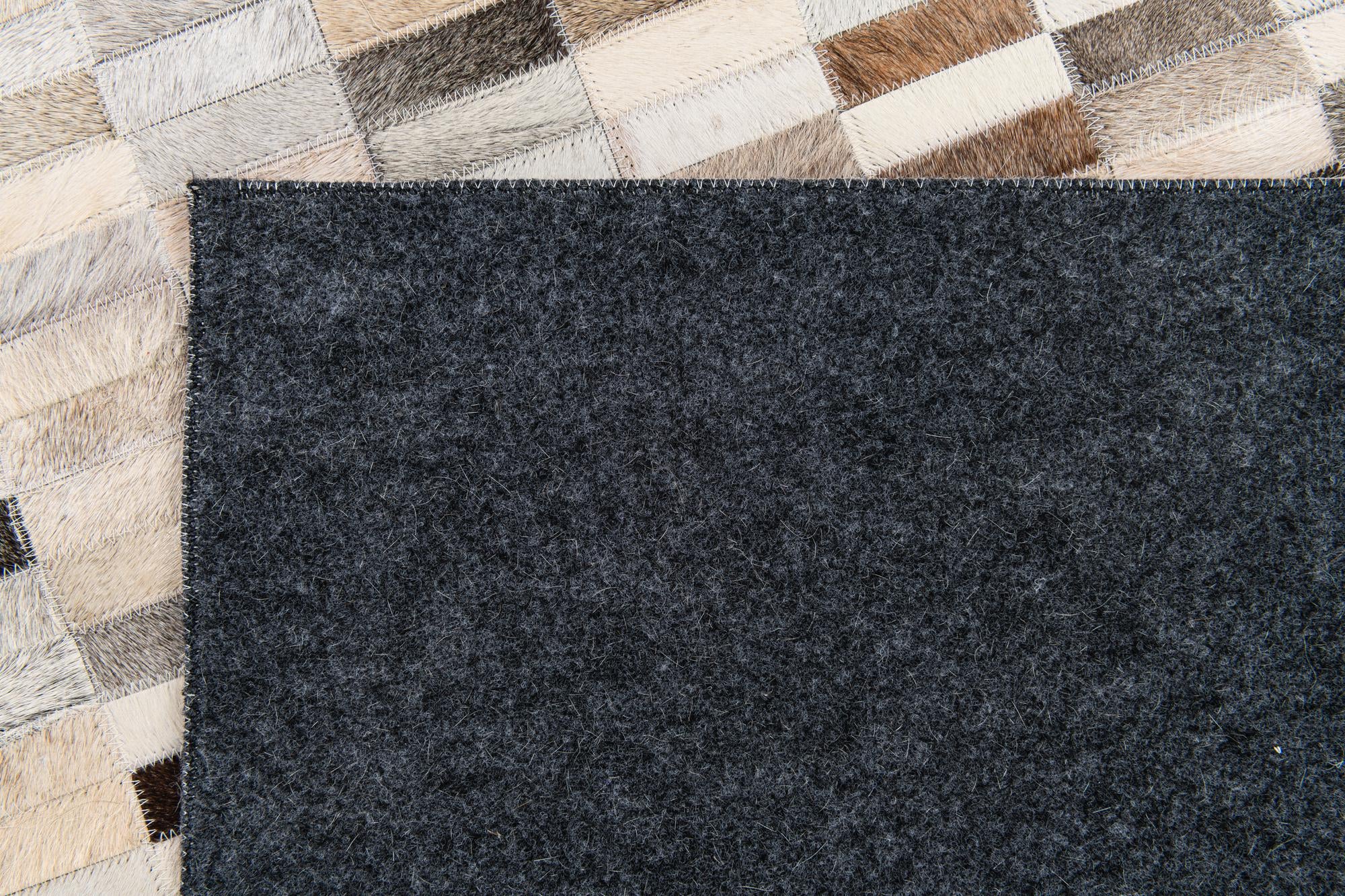 5' 1 x 7' 10 Cowhide Stocks Rug