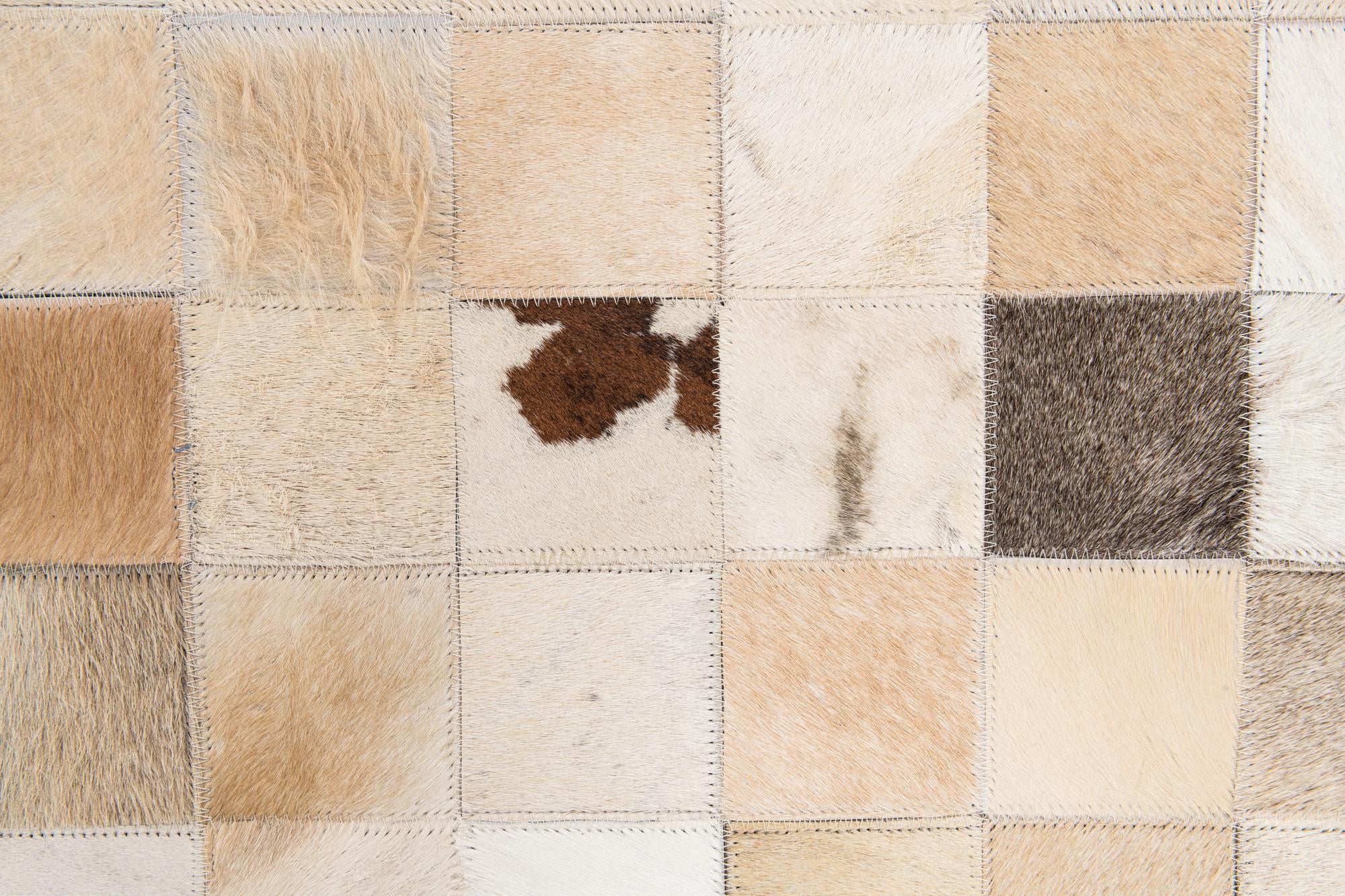 5' 1 x 7' 10 Cowhide Stocks Rug