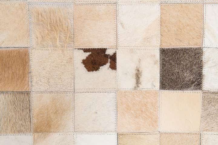 5' 1 x 7' 10 Cowhide Stocks Rug