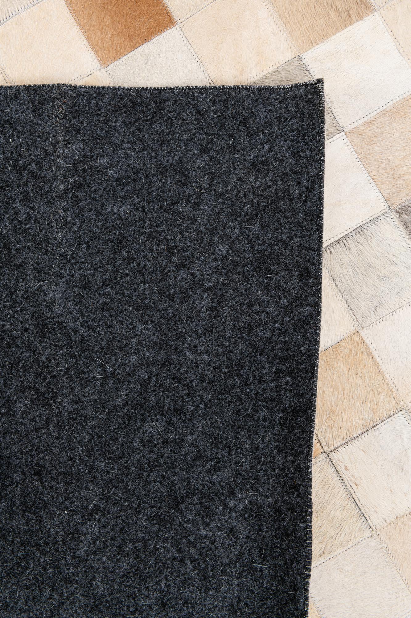 5' 1 x 7' 10 Cowhide Stocks Rug
