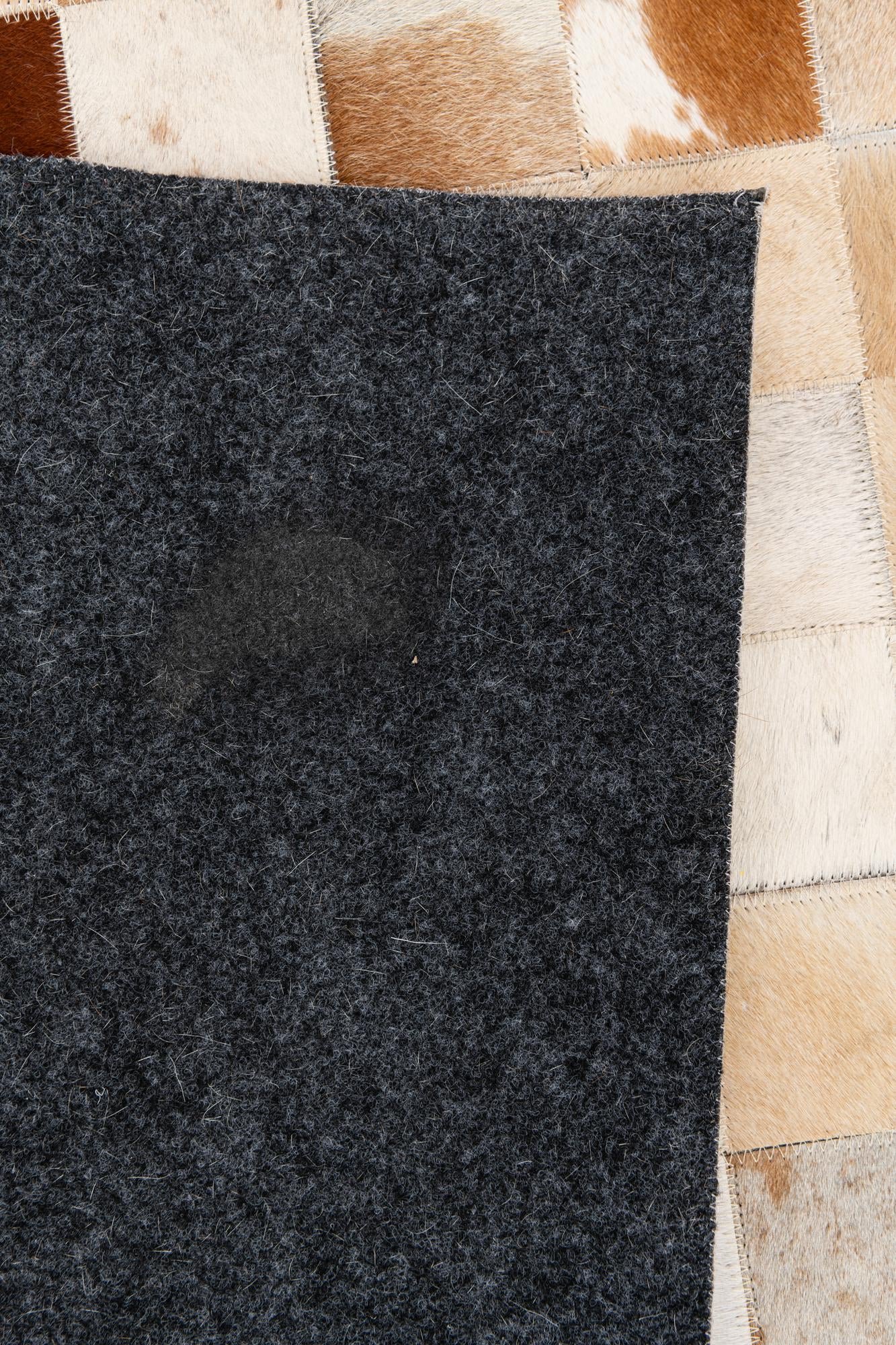 5' 1 x 7' 11 Cowhide Stocks Rug