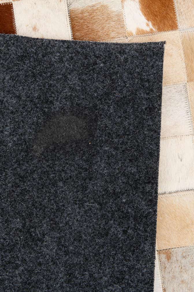 5' 1 x 7' 11 Cowhide Stocks Rug