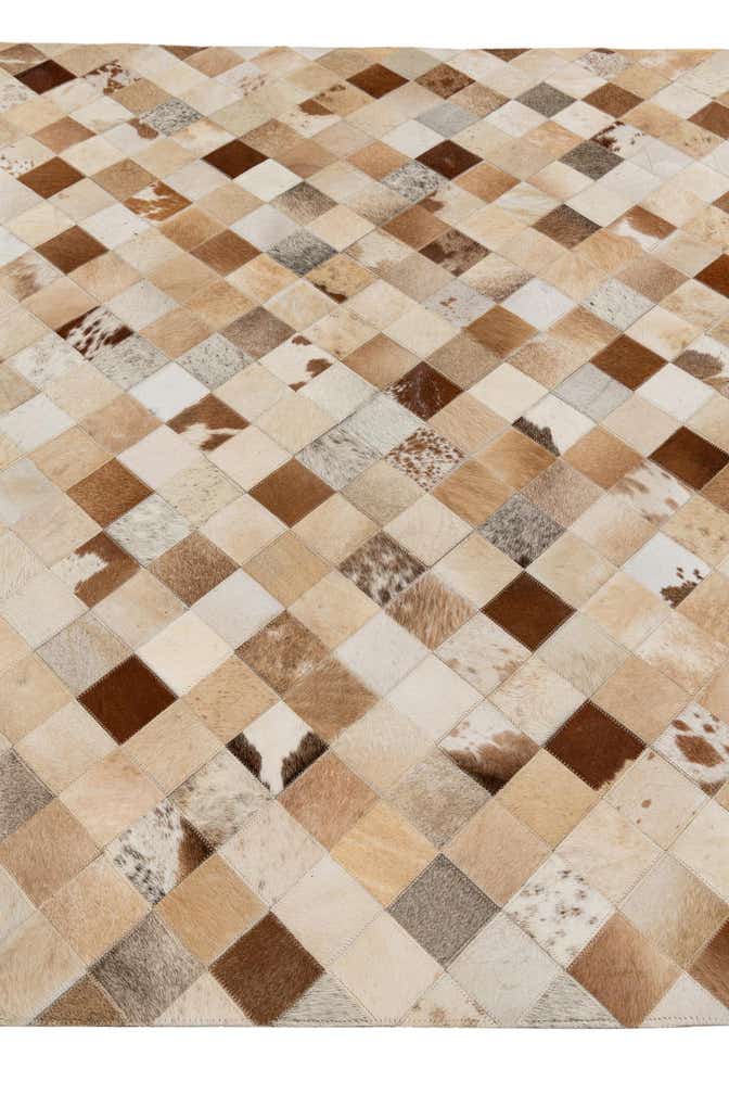 5' 2 x 8' 1 Cowhide Stocks Rug
