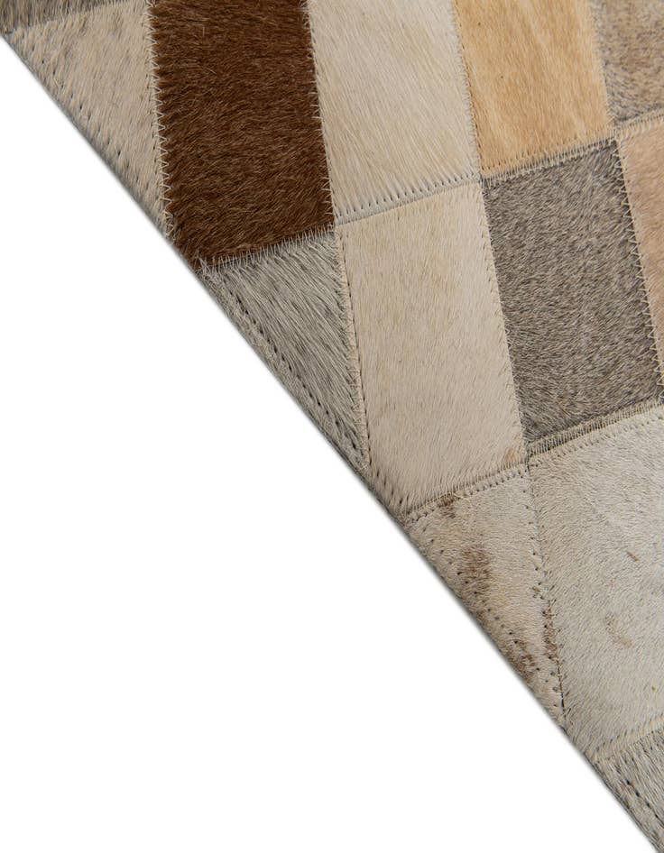 Detail image of 5' 2 x 8' 1 Cowhide Stocks Rug