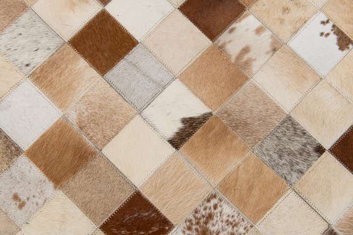 5' 2 x 8' 1 Cowhide Stocks Rug