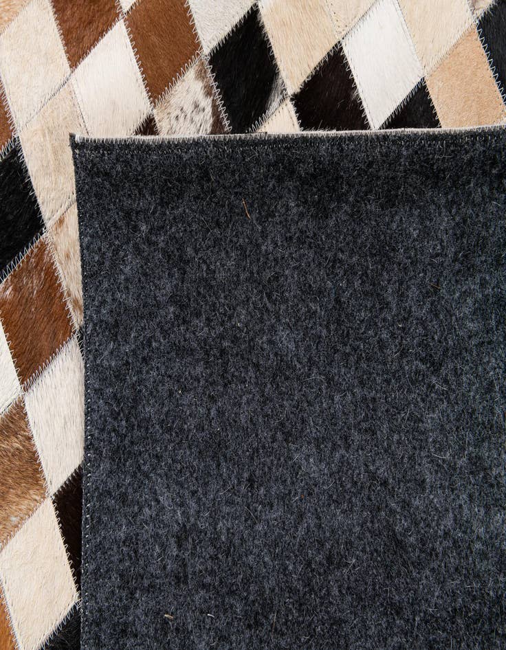 Detail image of 5' x 8' Cowhide Stocks Rug