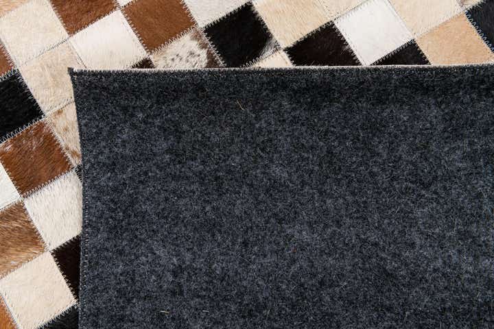 5' x 8' Cowhide Stocks Rug