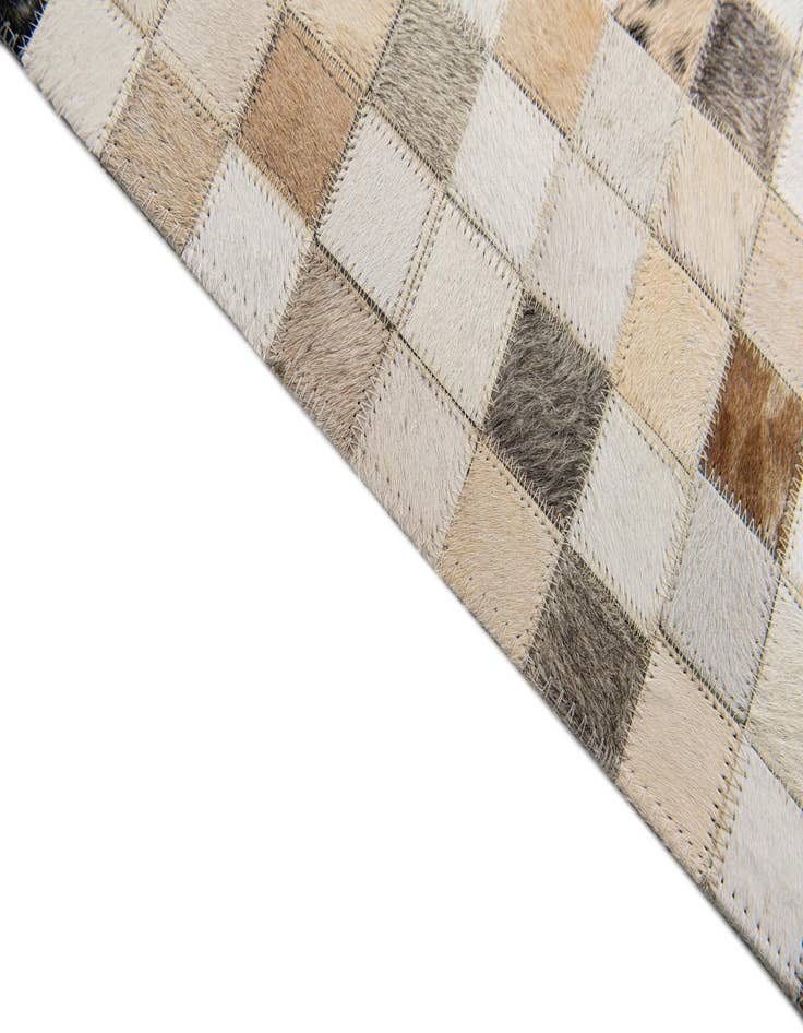 Detail image of 5' x 7' 11 Cowhide Stocks Rug