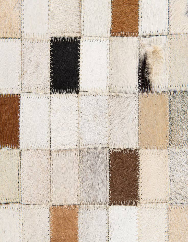 Detail image of 5' x 7' 11 Cowhide Stocks Rug