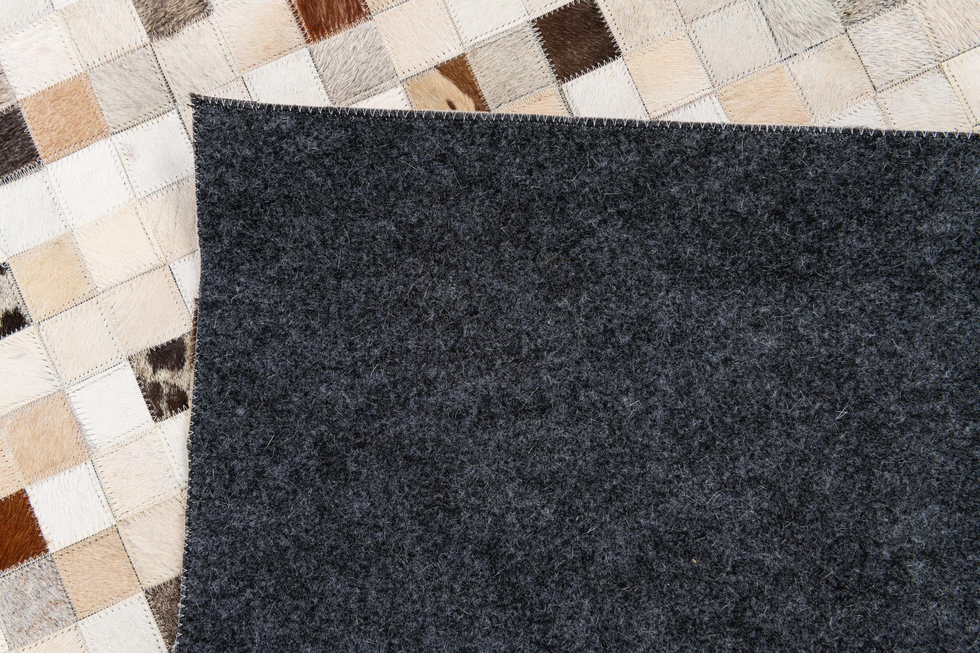 5' x 7' 11 Cowhide Stocks Rug