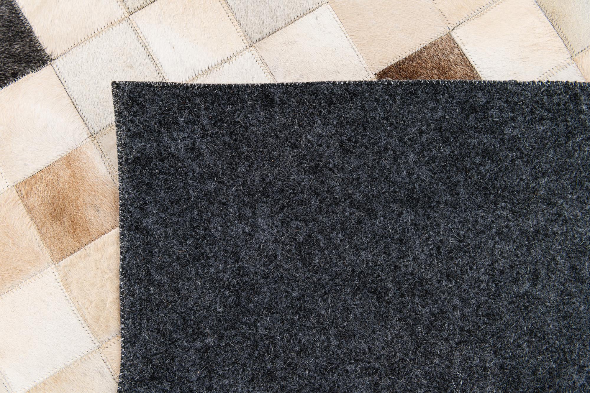 5' 1 x 7' 11 Cowhide Stocks Rug